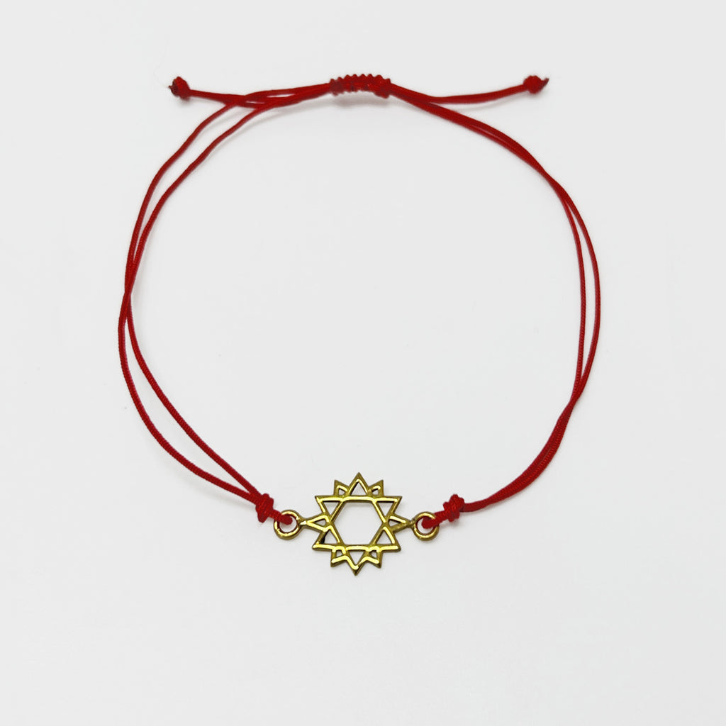 Akil isik uretkenlik timsali yildiz motifli kirmizi ipli bileklik_Red string bracelet with eight pointed star symbolizing light wisdom and productivity