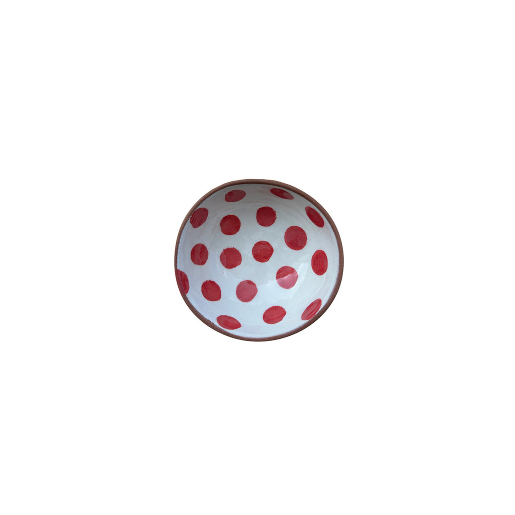 Beyaz ustune kirmizi benekli seramik kasenin ici_Inside of the red dotted white ceramic bowl