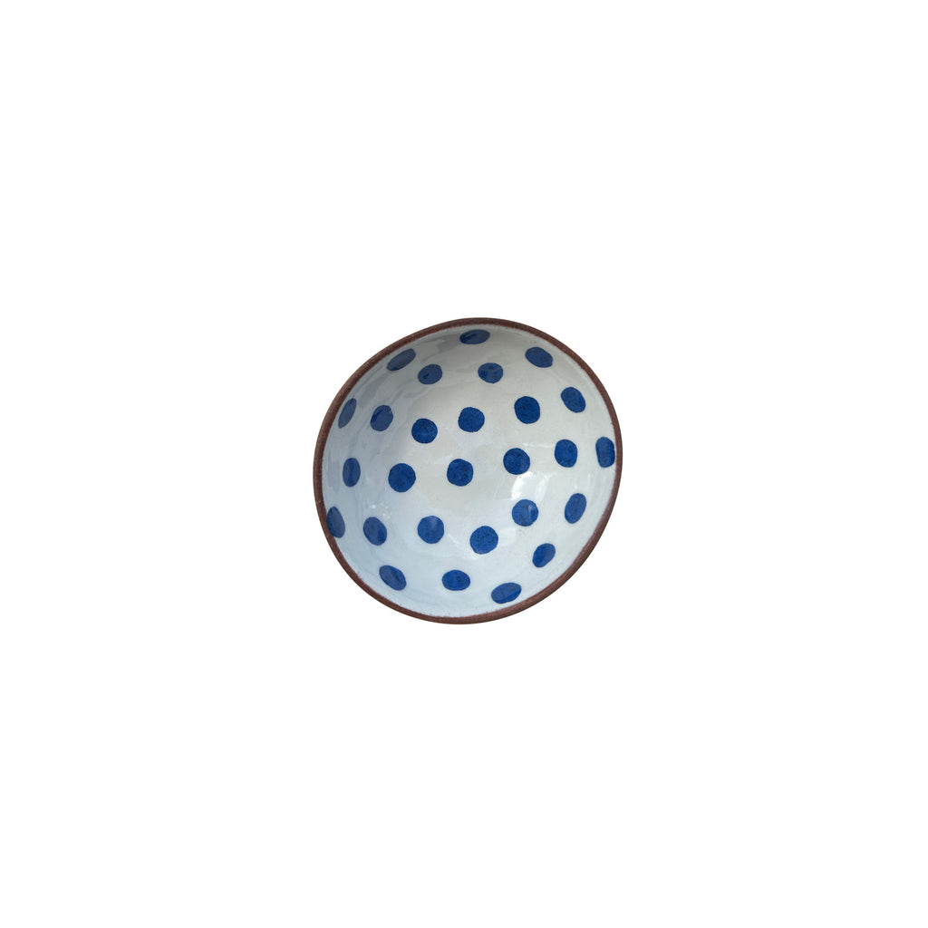 Beyaz ustune mavi benekli seramik kasenin ici_Inside of the blue dotted white ceramic bowl
