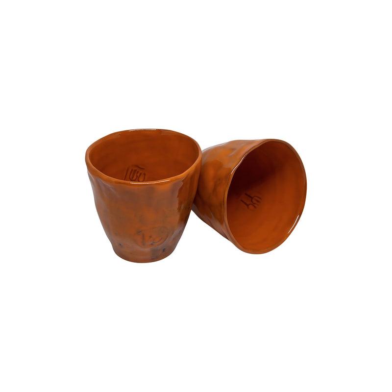 Biri yatik duran iki adet hediyelik turuncu disi sekilsiz seramik bardak_Two orange giftware ceramic cups