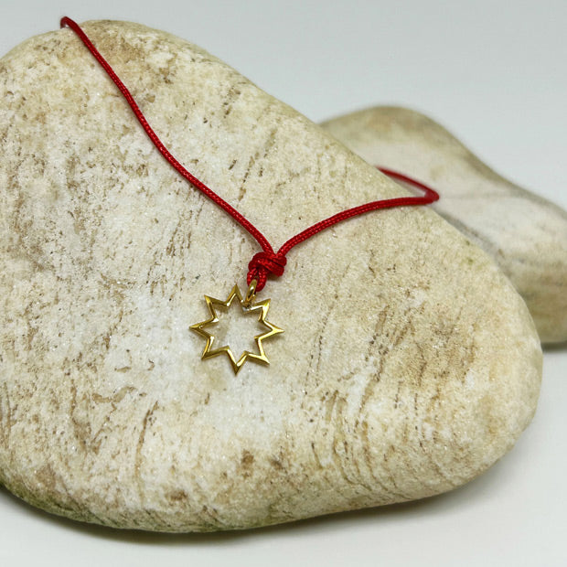 Isik akil ve uretkenlik sembolu yildiz motifli kirmizi ipli bileklik_Red string bracelet with star motif symbol of light wisdom and productivity
