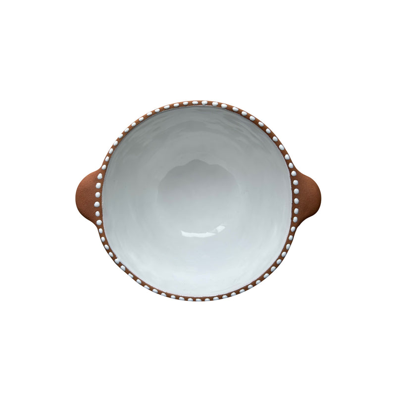Kulplu seramik kasenin beyaz ici_White interior of earthy colored ceramic bowl with handle