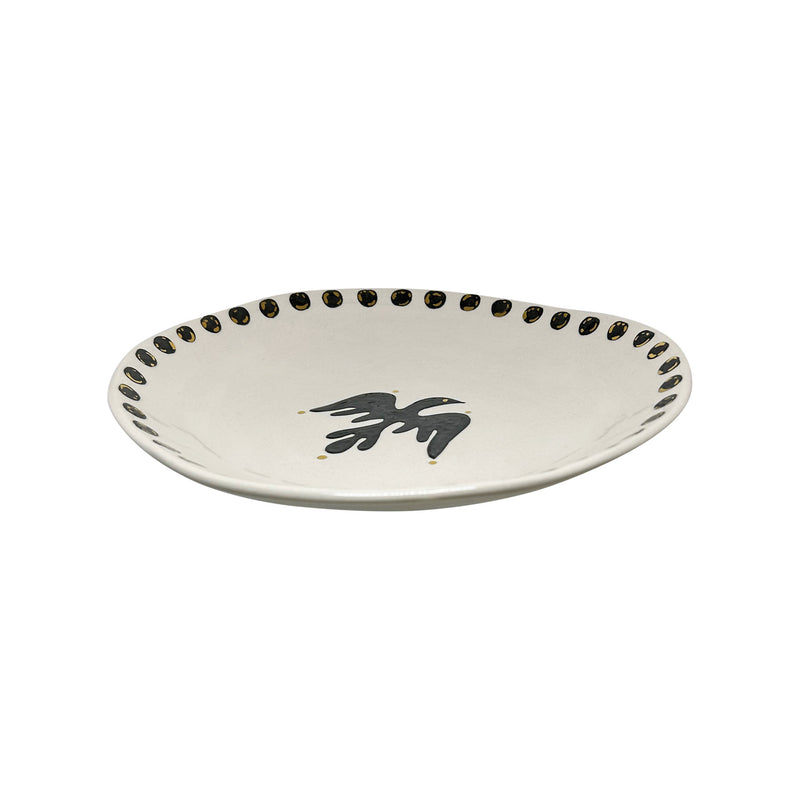 Siyah kus ve beneklerle bezenmis kirik beyaz dekoratif tabak_Off white decorative plate with black spots and bird motif