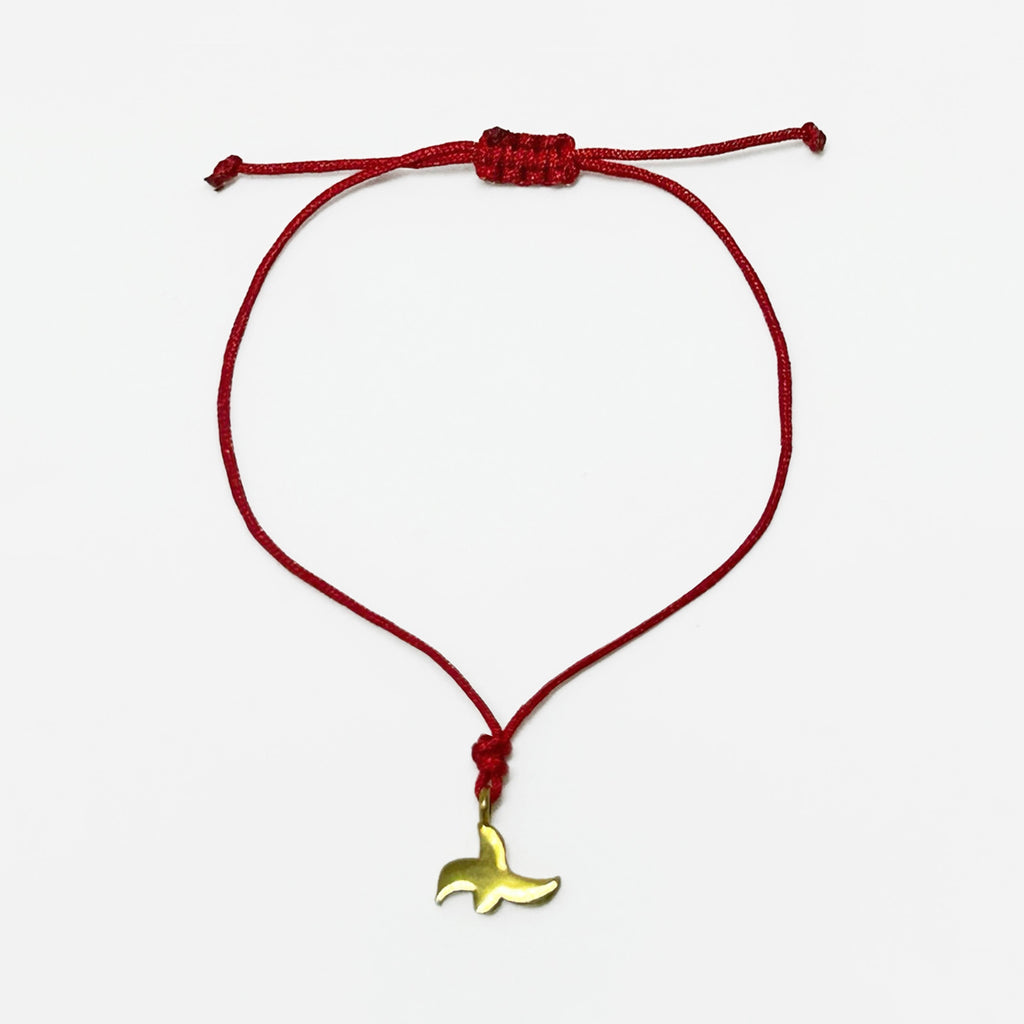 Stilize kus motifi bir Afyon kecesinden alinma kirmizi ipli bileklik_Red string bracelet with stylized bird motif taken from a traditional felt