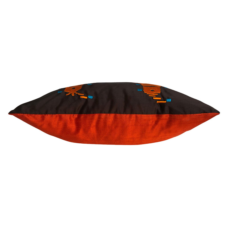 Turuncu aci kahve renklerdeki koltuk yastiginin yan gorunsu_Side view of an armchair cushion in orange and brown colors